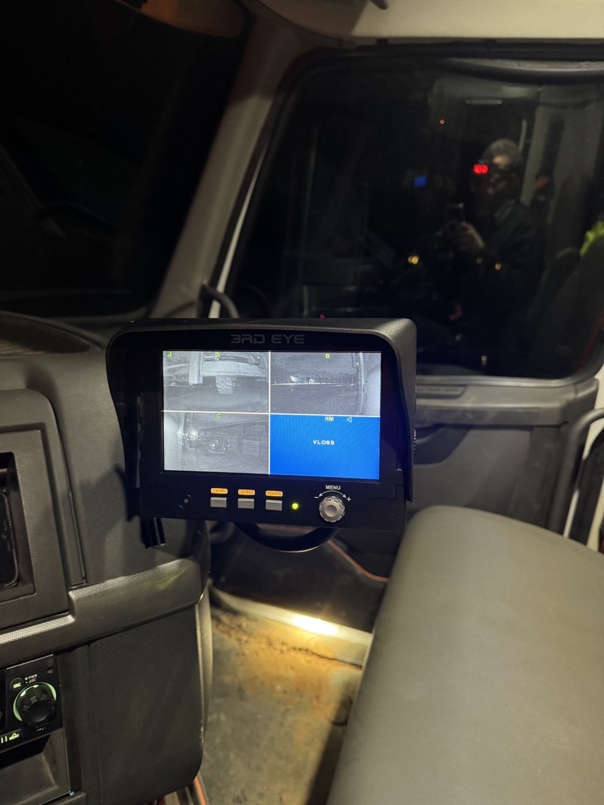 In-cab monitor installation showing multi-camera view